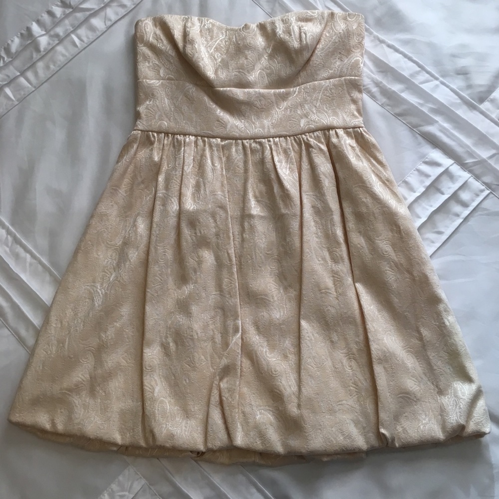 Pretty little cream strapless bubble dress
